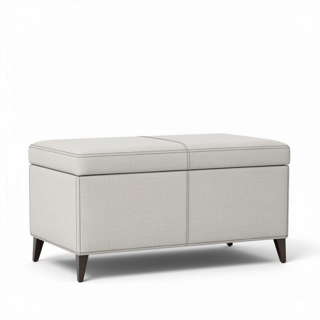 Opberg Ottoman in lichtgrijs stof met afmetingen 90 x 45 x 45cm